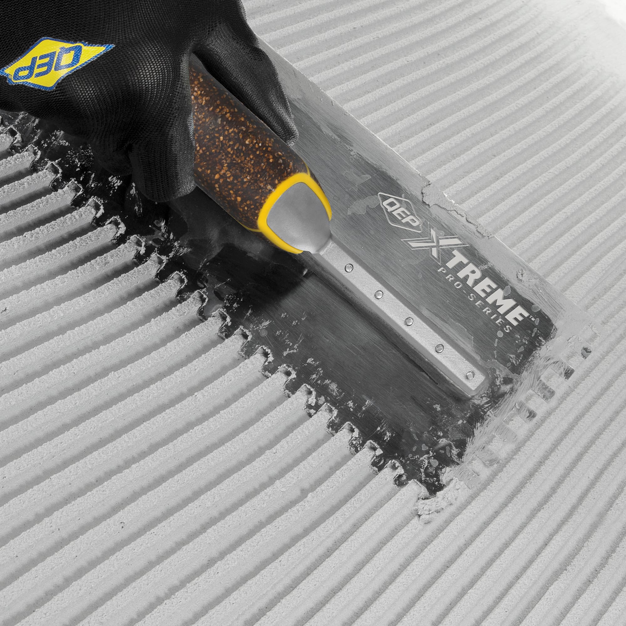 1/4" x 3/8" x 1/4" Square Notch Stainless Xtreme Trowel w/ Cork Handle - 3