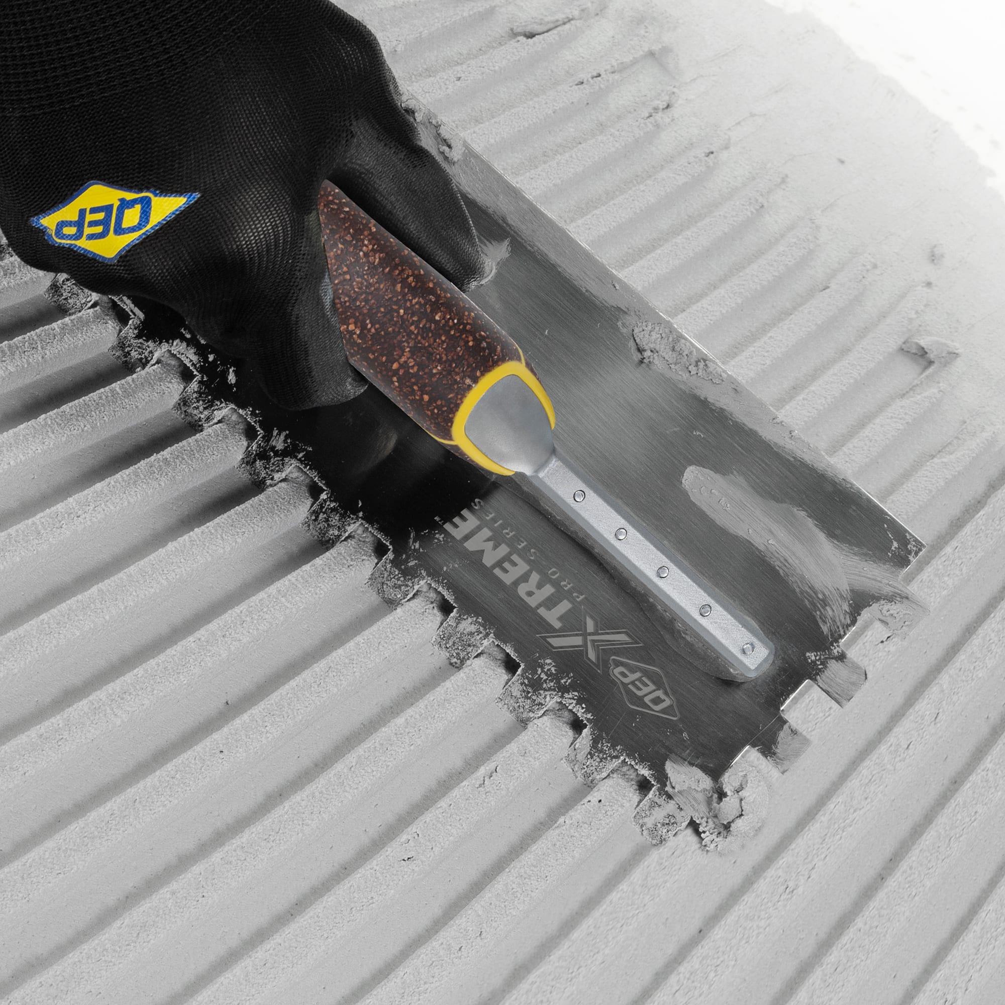 1/2" x 1/2" x 1/2" Square Notch Stainless Xtreme Trowel w/ Cork Handle - 3