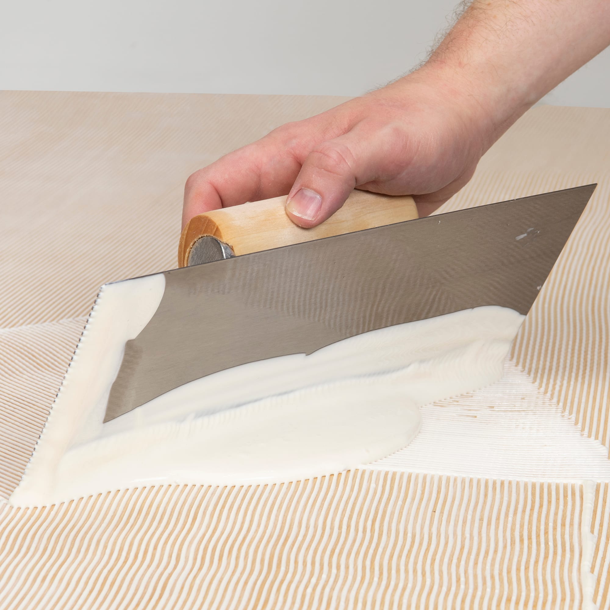 1/16" x 1/16" x 1/16" Square Notch Pro Flooring Adhesive Trowel - 3