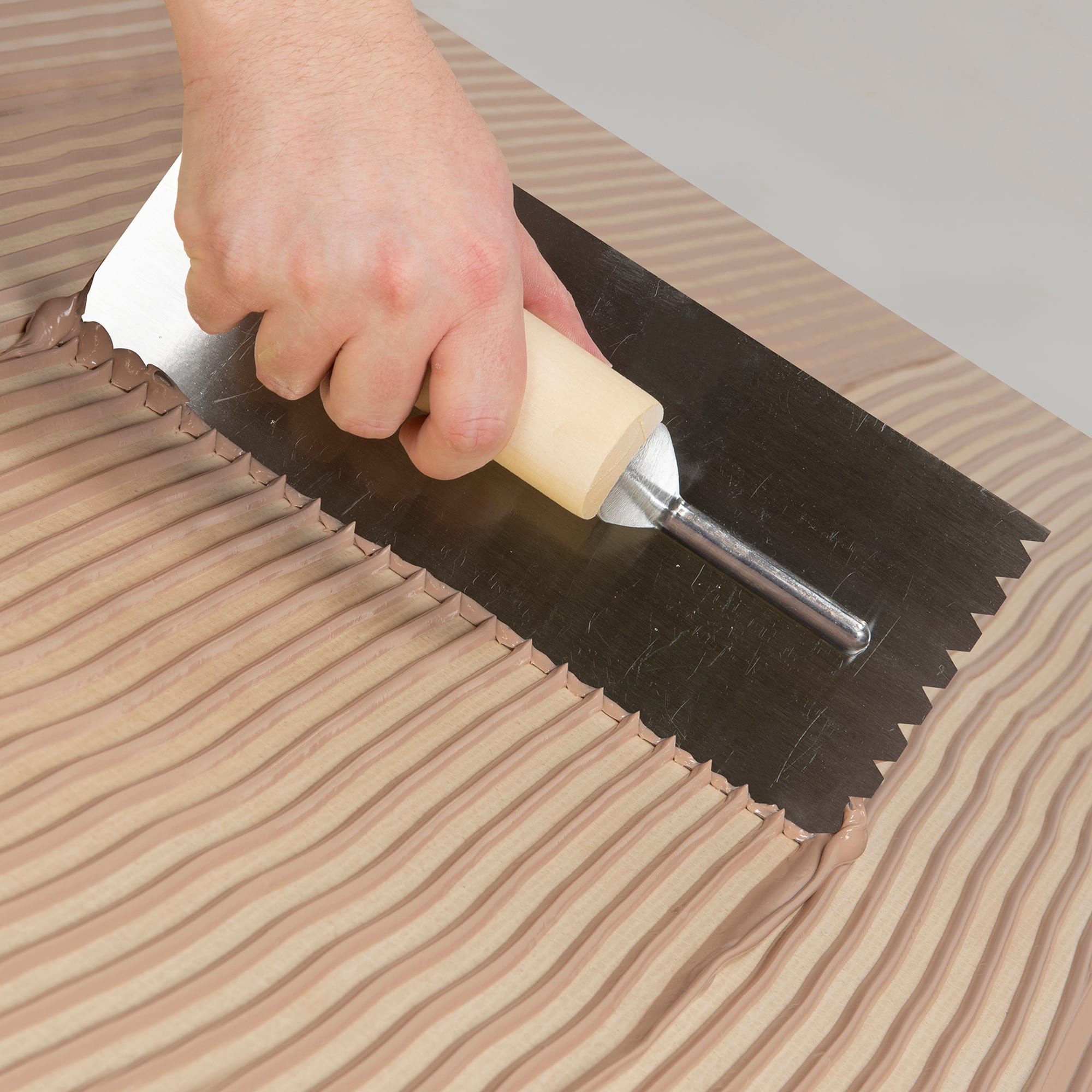1/4" x 1/4" x 1/4" Flat Top V-Notch Wood Pro Flooring Trowel - 3